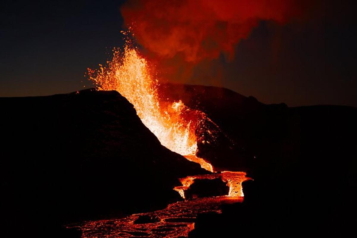 a fire is burning on top of a mountain