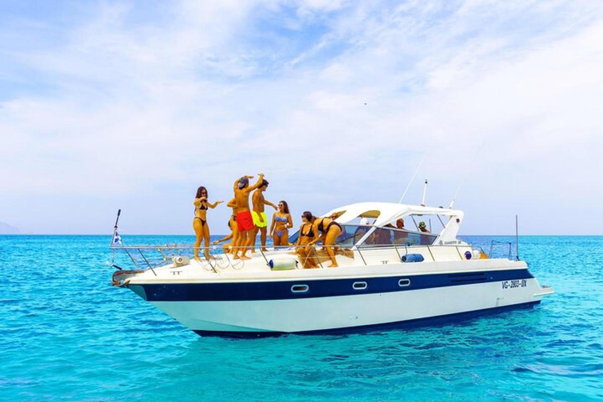 a group of people on a boat in the water