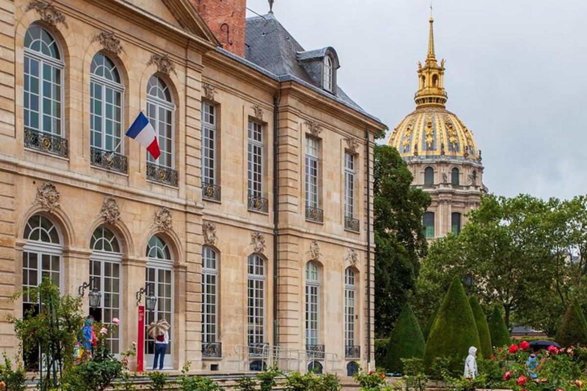 a large building with a flag in front of it