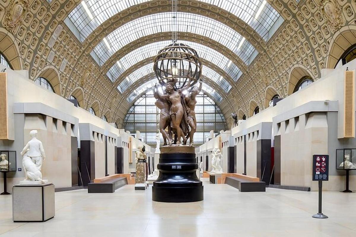 a museum with a statue in the middle of a room