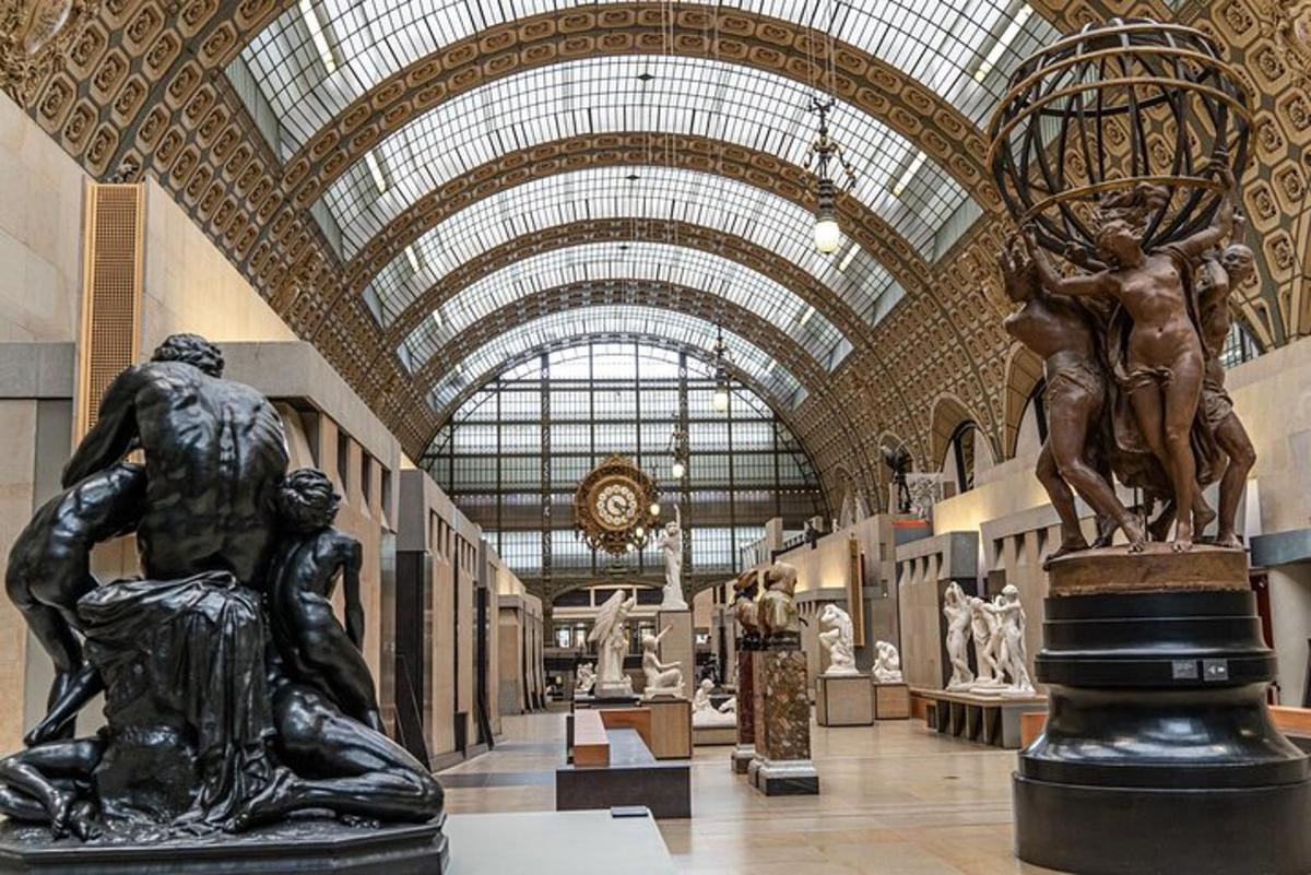 a museum with a statue in the middle of a hall
