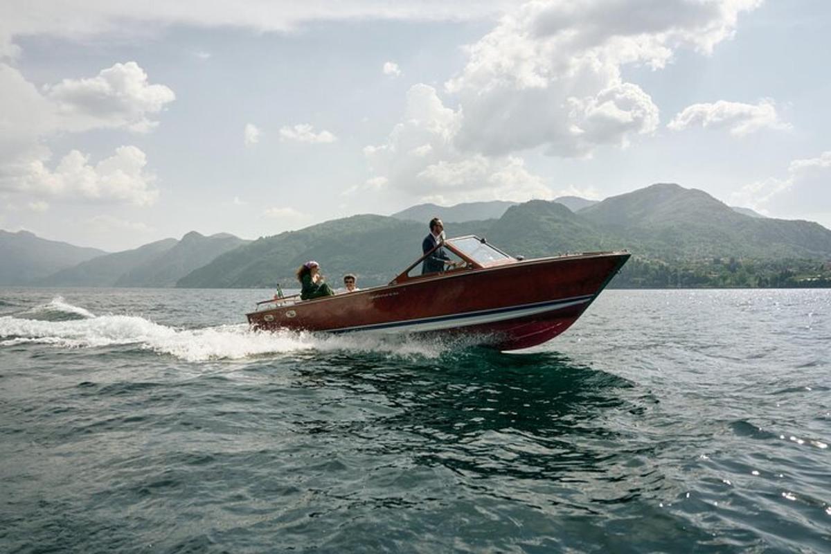 a group of people on a boat in the water