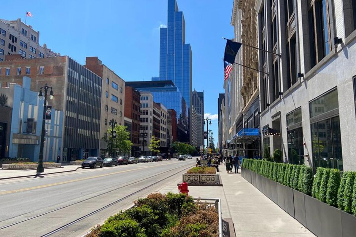 a city street with people walking down the street