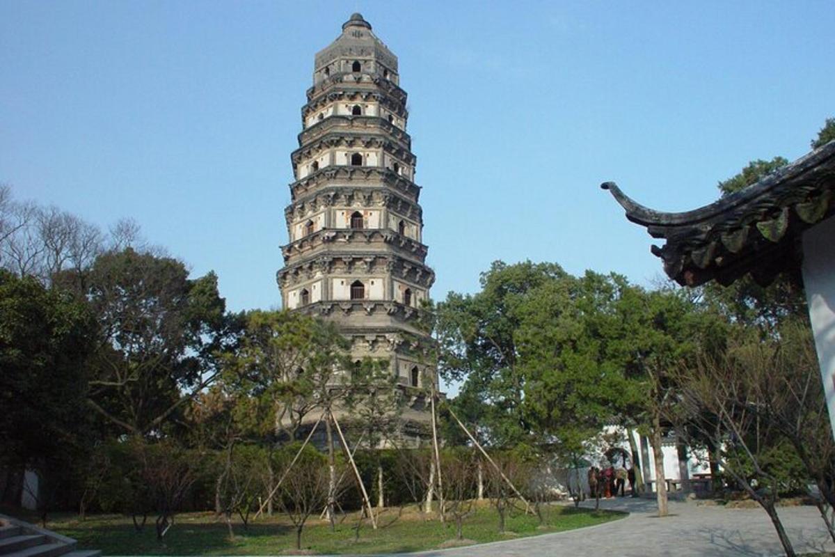 a tall tower in the middle of a park