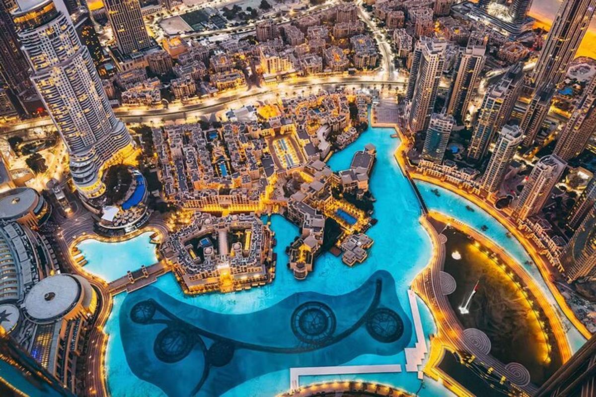 an aerial view of the city of dubai at night