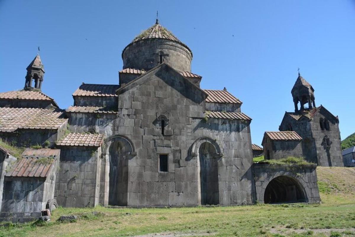 an old castle with a horse on top of it