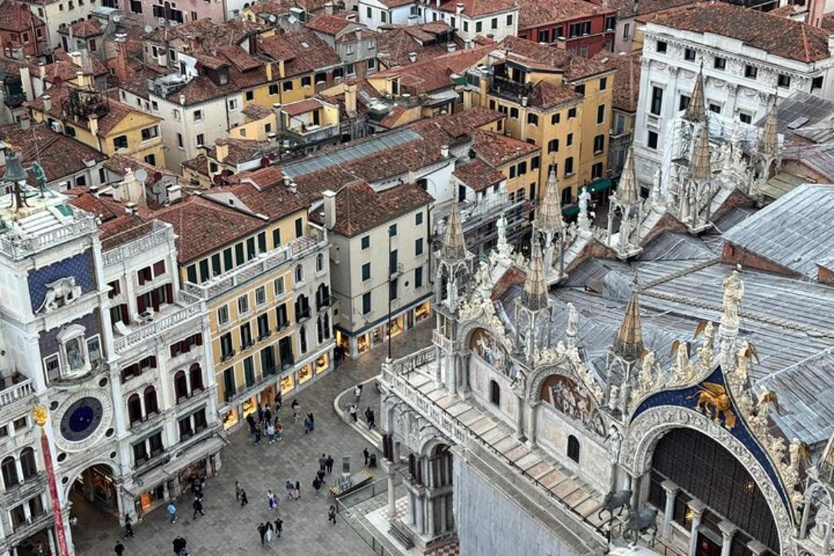 an overhead view of a city with a cathedral