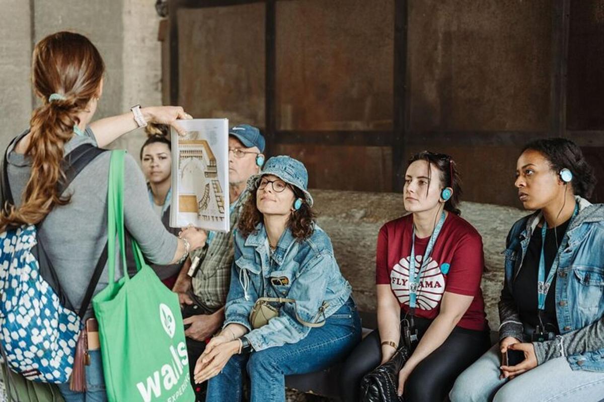 a woman taking a picture of a group of people