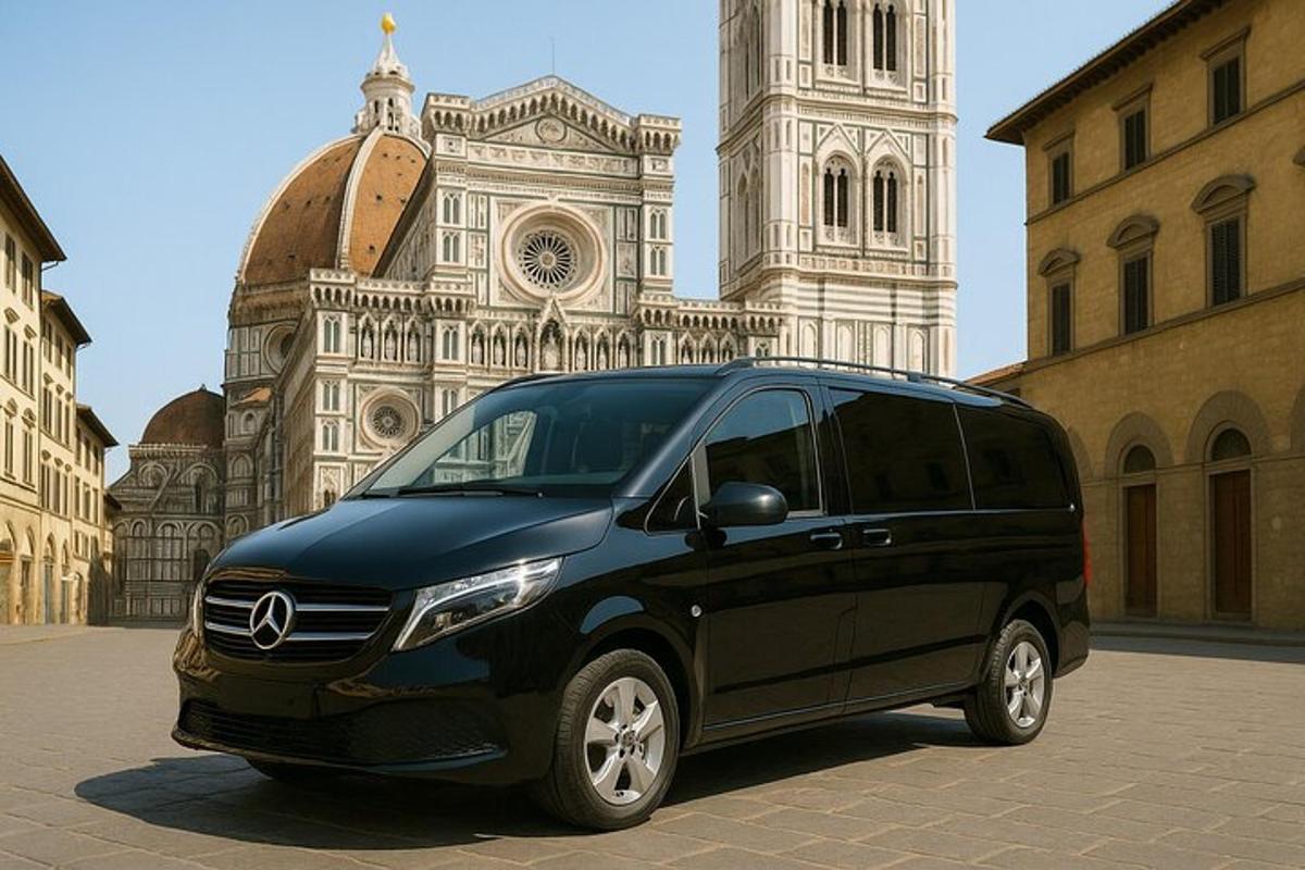 un furgone nero parcheggiato davanti a un edificio