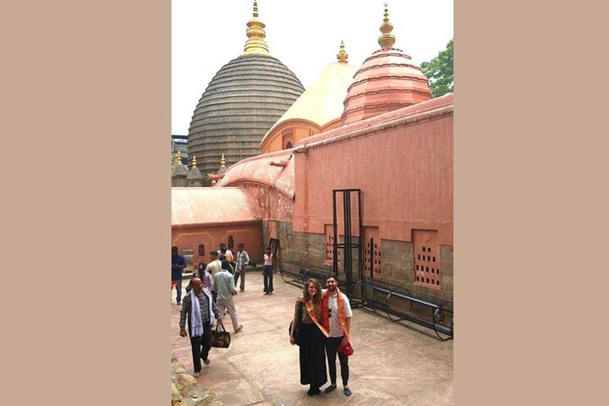 a group of people standing in front of a temple