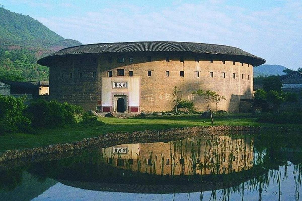 a large building next to a body of water