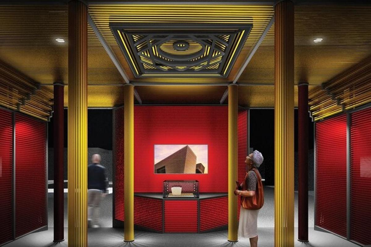 a woman is standing in a room with red and yellow columns