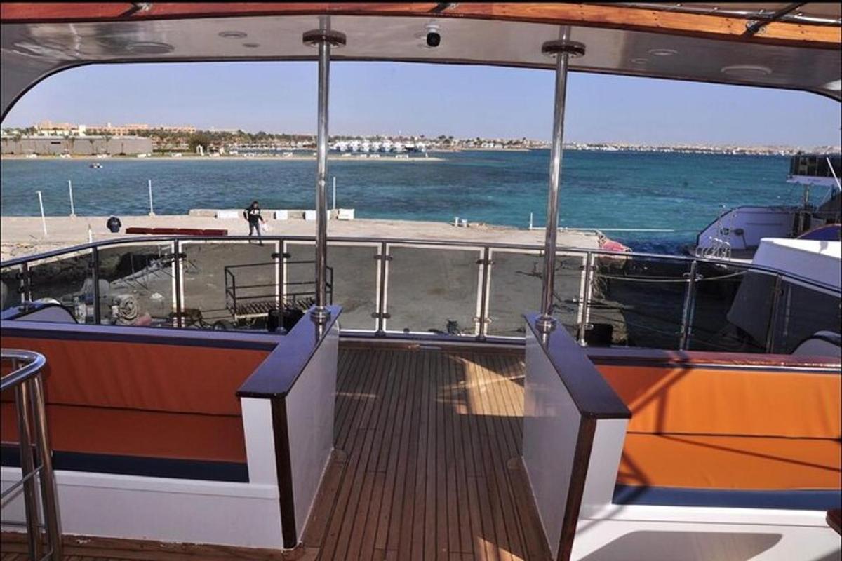 a boat with a ramp on the side of the water