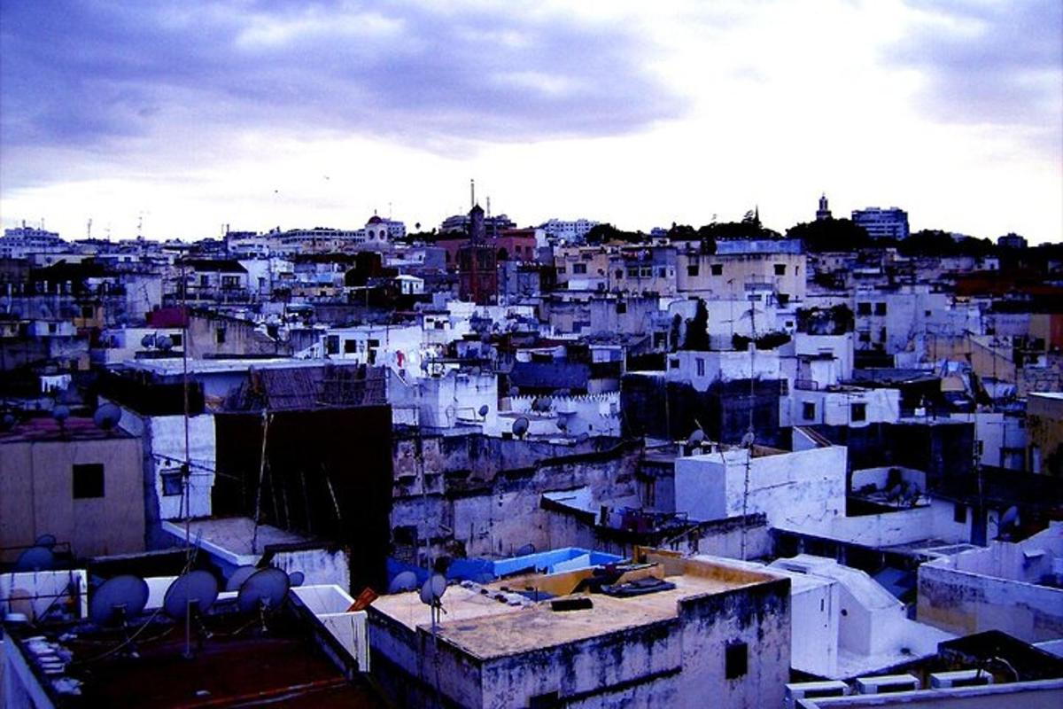 a view of a city with white buildings