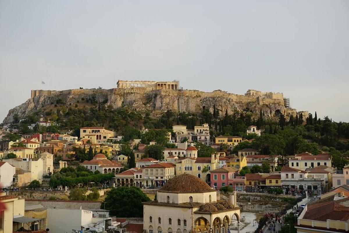 a view of a town with a mountain in the background