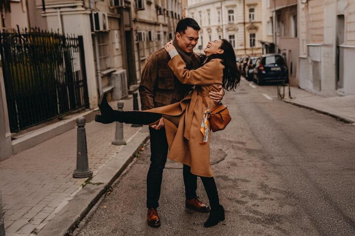 a man and a woman standing on a street