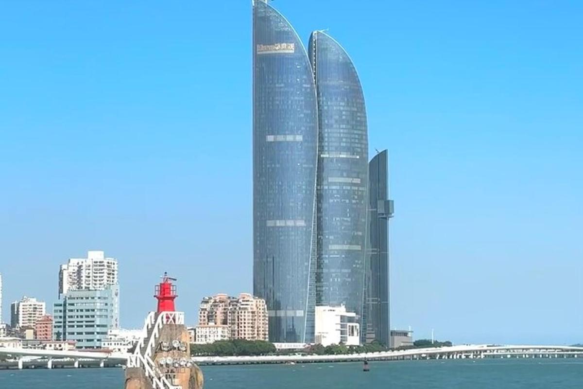 a view of a city with two tall buildings