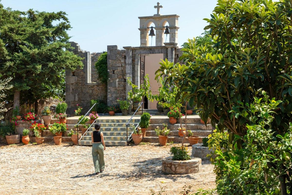 a person standing in front of a church