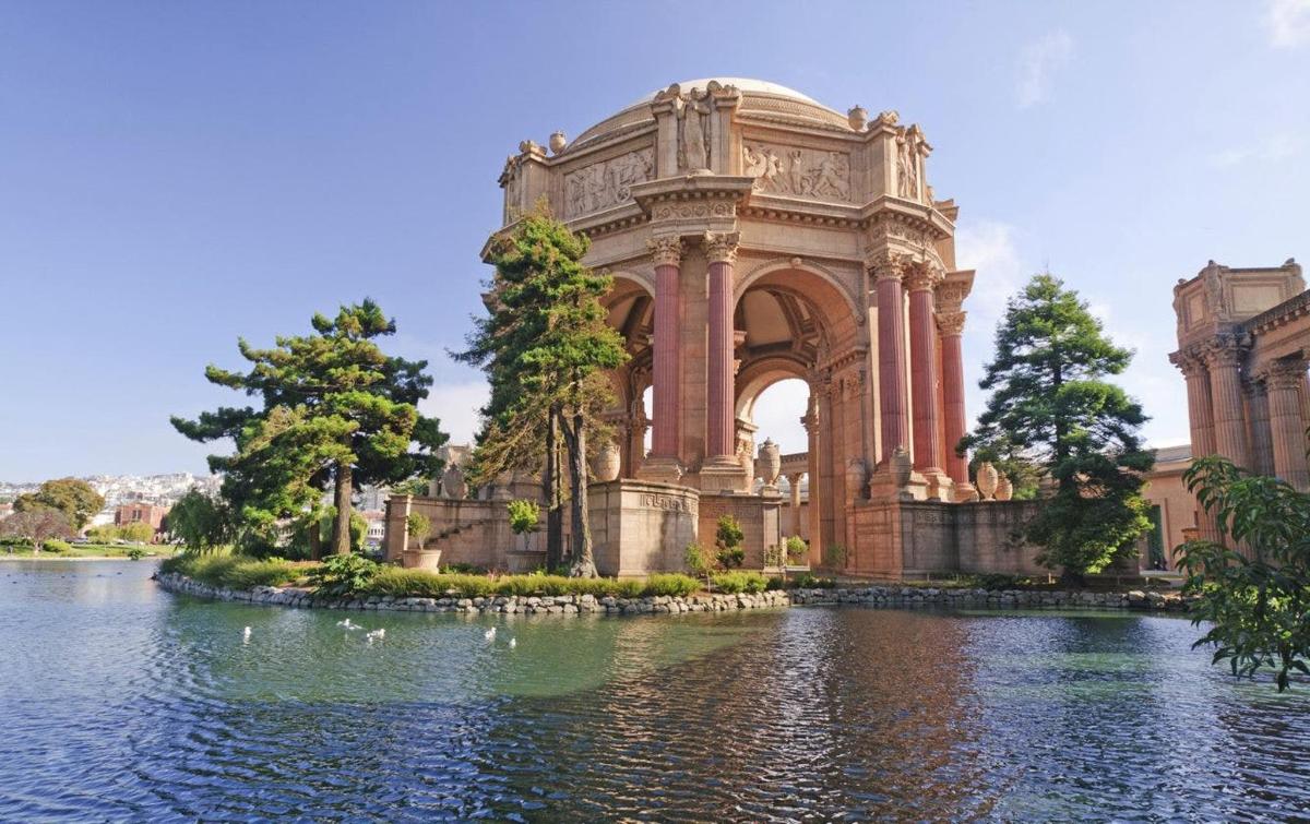 a large building in the middle of a body of water