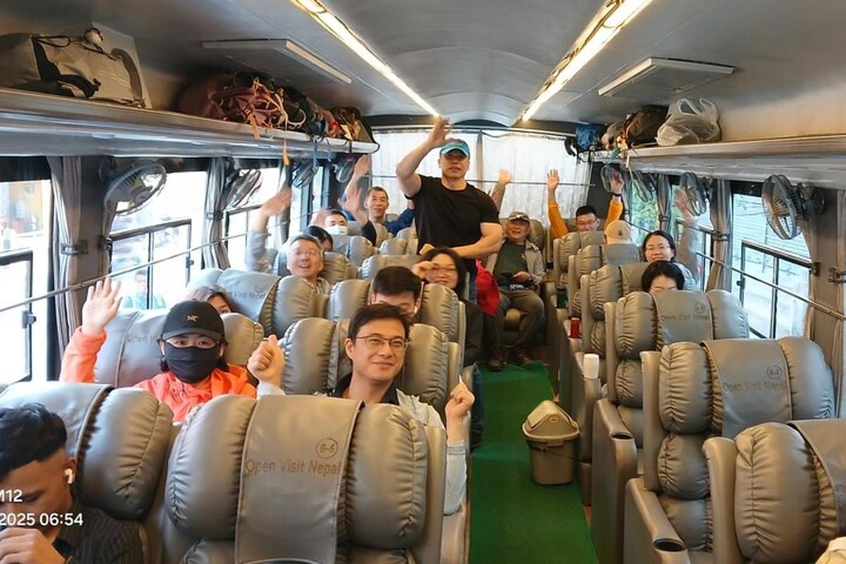 a group of people sitting on a bus