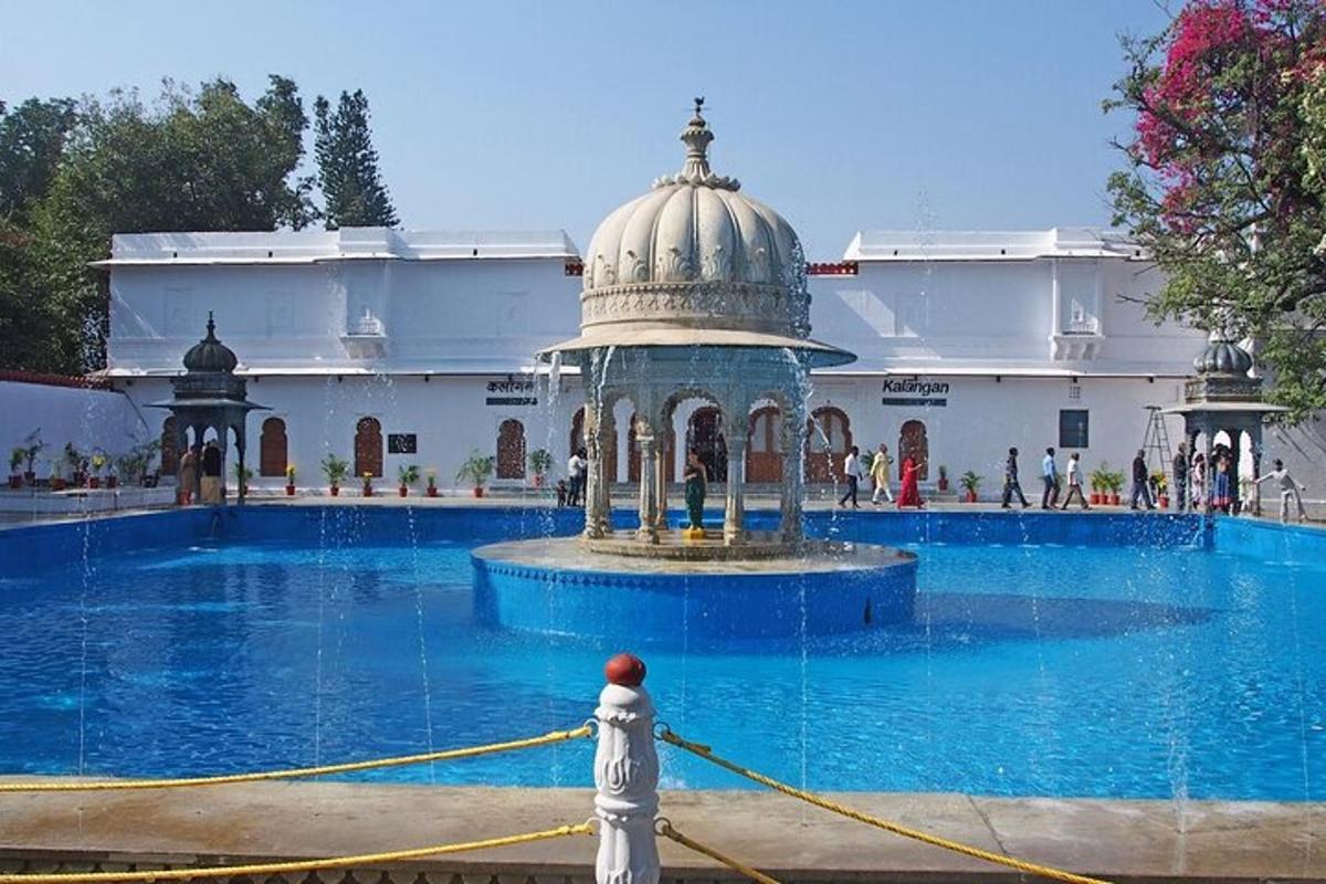 a person is tied up to a fountain in a building