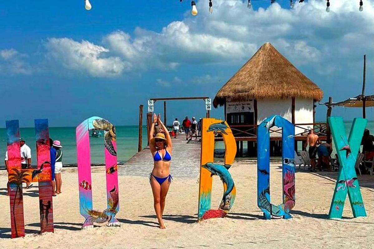 a woman in a bikini standing on a beach