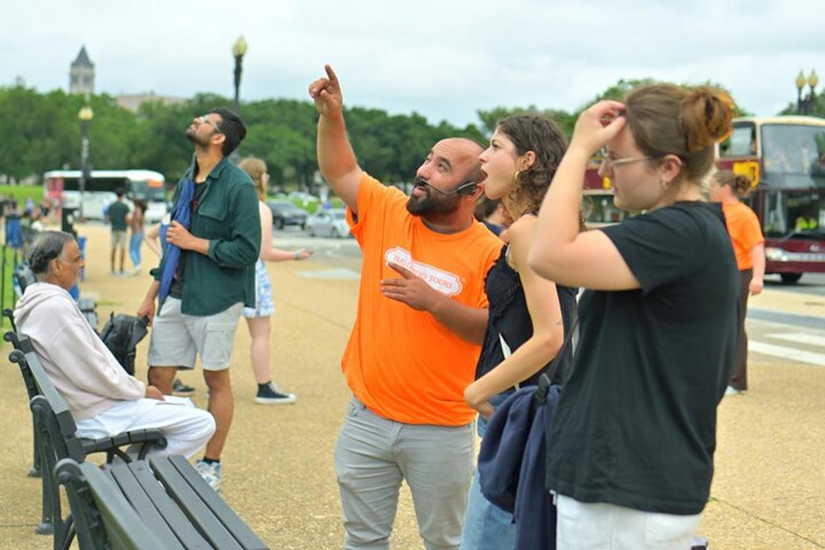a group of people standing around in a park