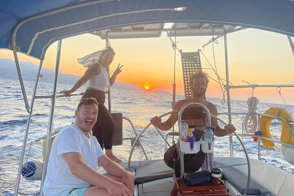 a group of people on a boat in the water