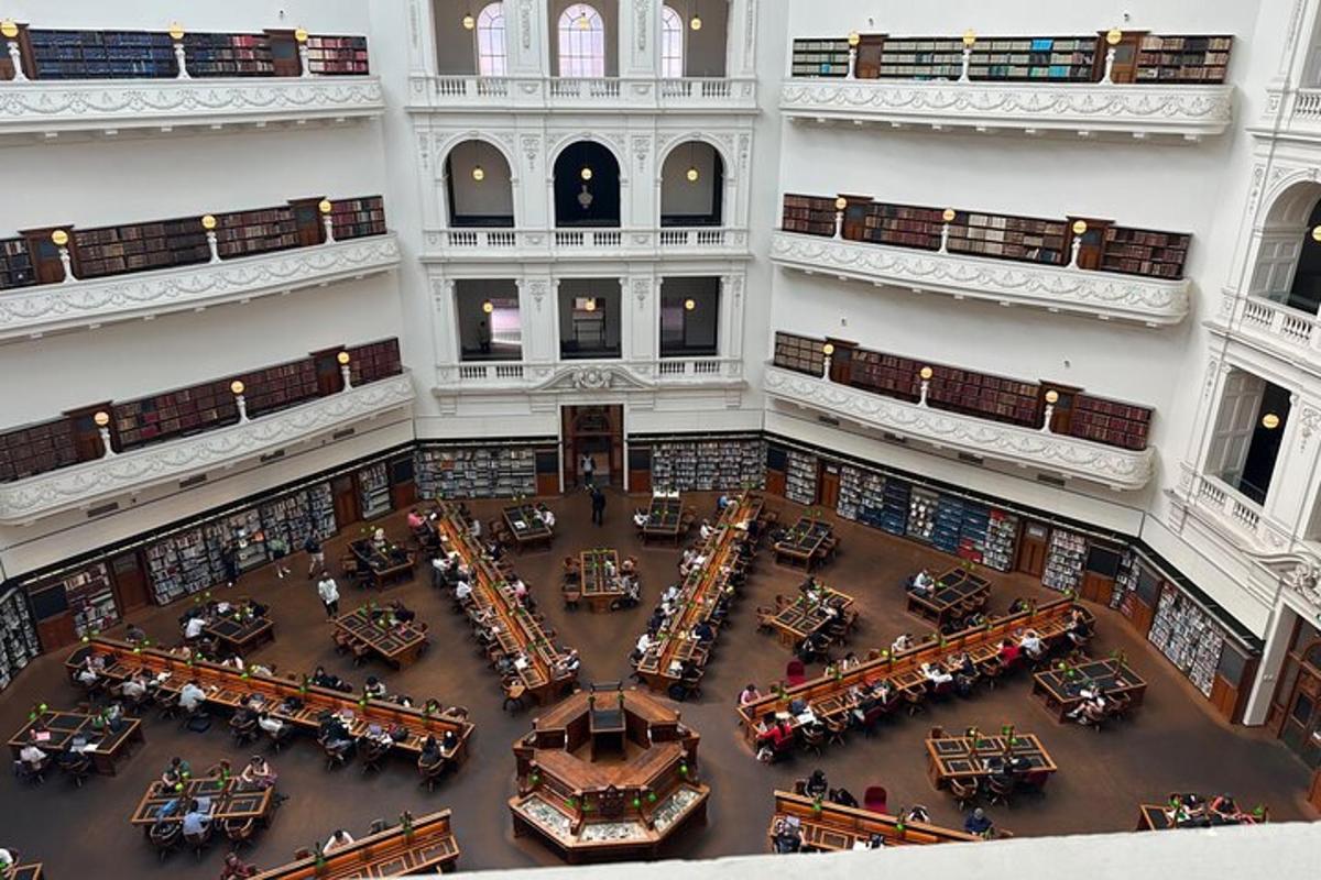 an overhead view of a library with tables and books