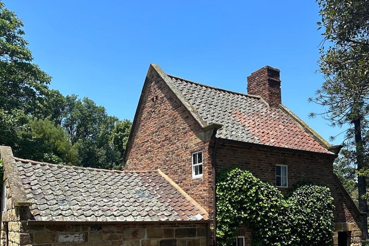 a brick house with a chimney on top of it