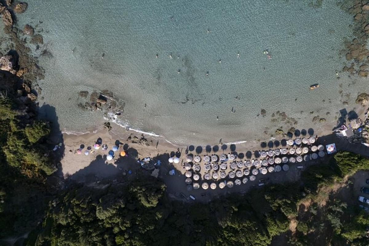 an aerial view of a group of buildings on the beach