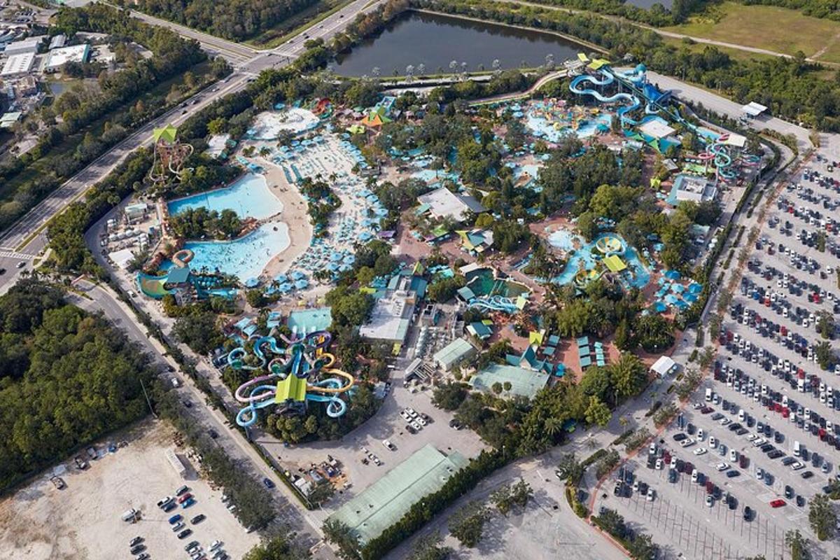 an aerial view of a water park with a pool