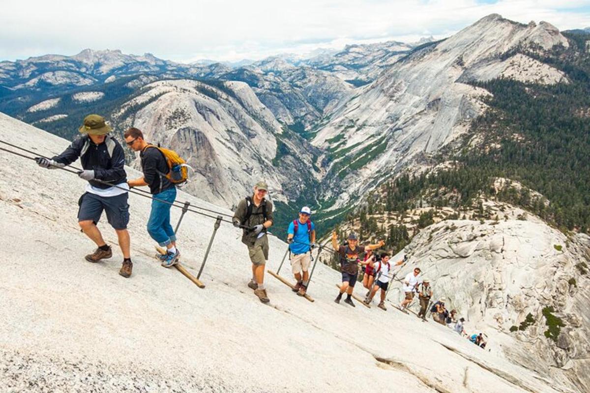a group of people hiking up a mountain