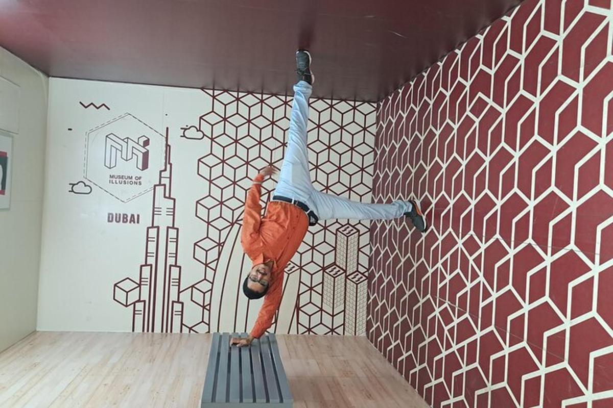 a man is doing a handstand on a wall