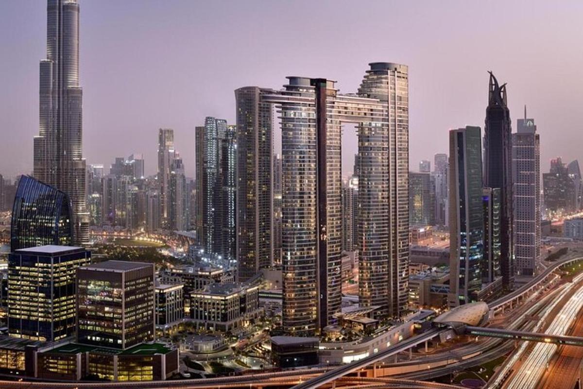 a large city with many tall buildings and highways