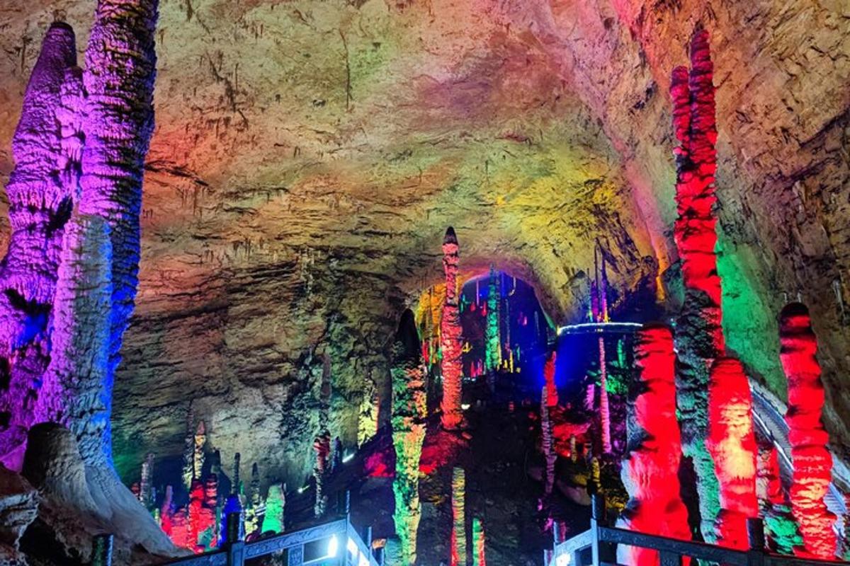 a cave with colorful lights in it