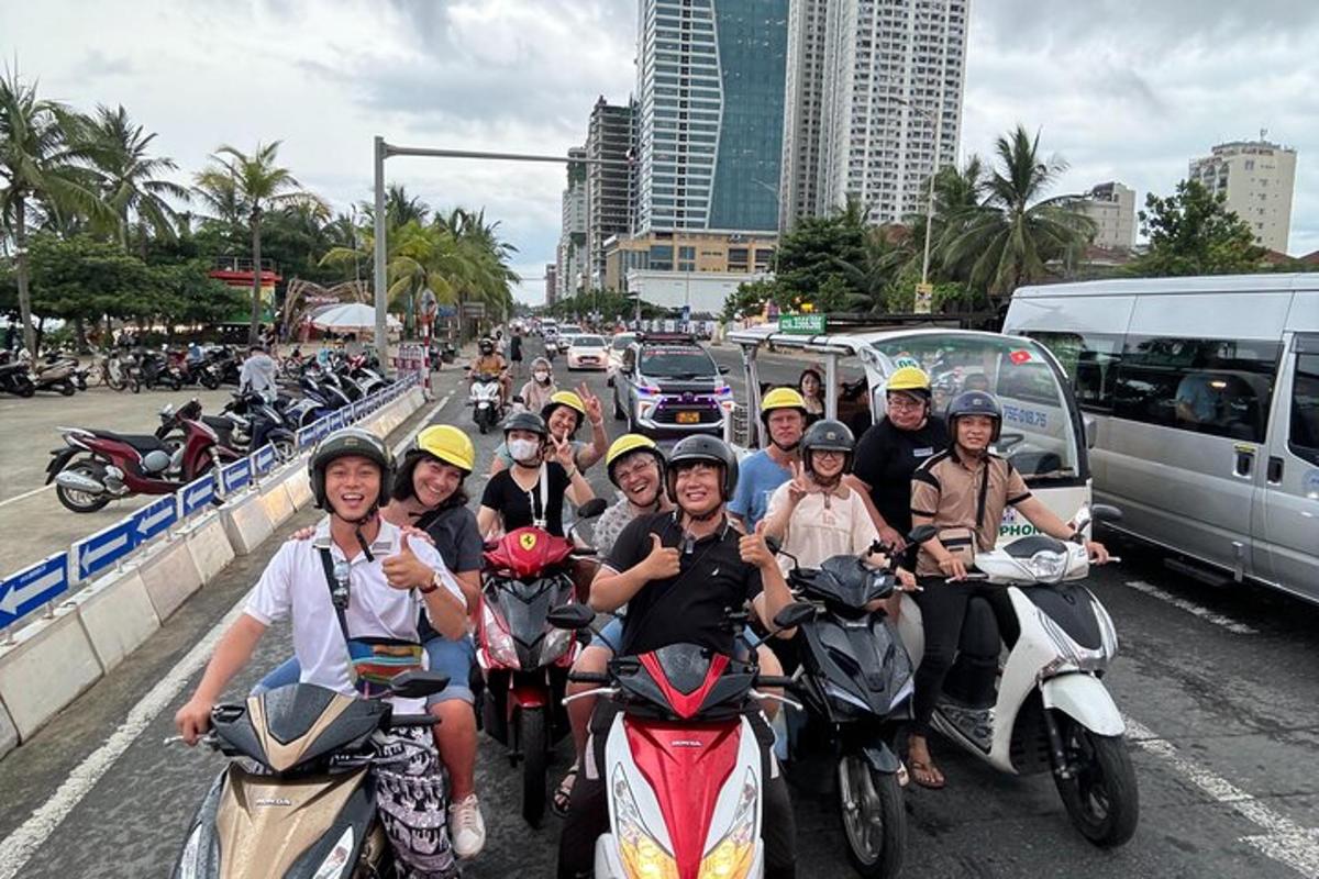 a group of people riding motorcycles on a city street