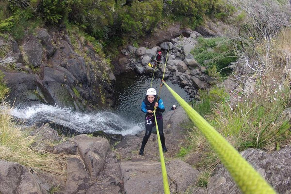 a woman is on a raft in a river