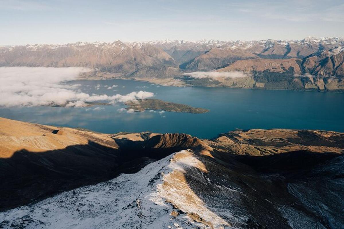 a view of a body of water from the top of a mountain