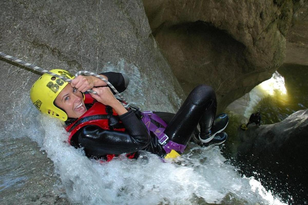 a woman is on a raft in a river