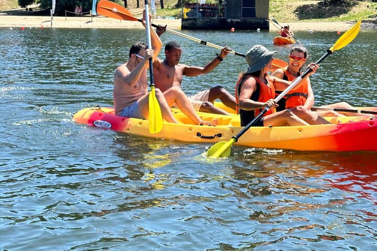 a group of people kayaking on the water