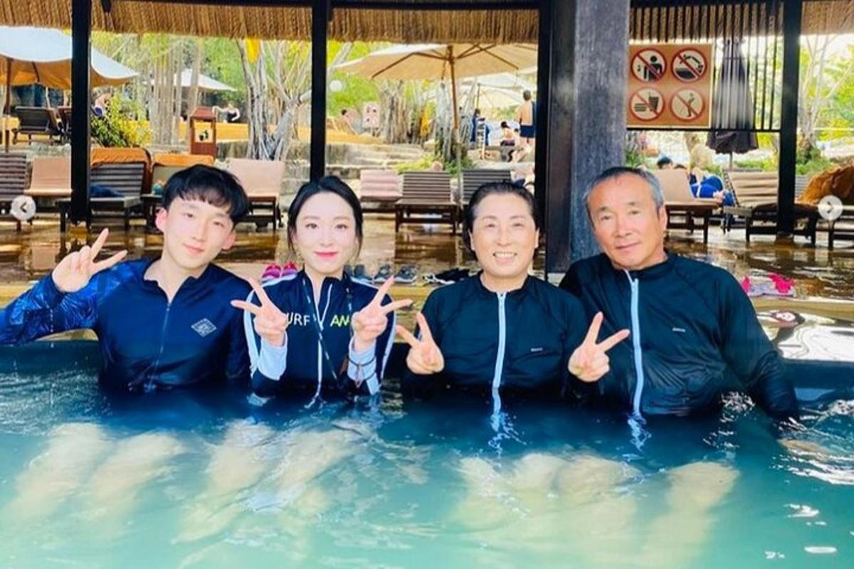 a group of people in a swimming pool