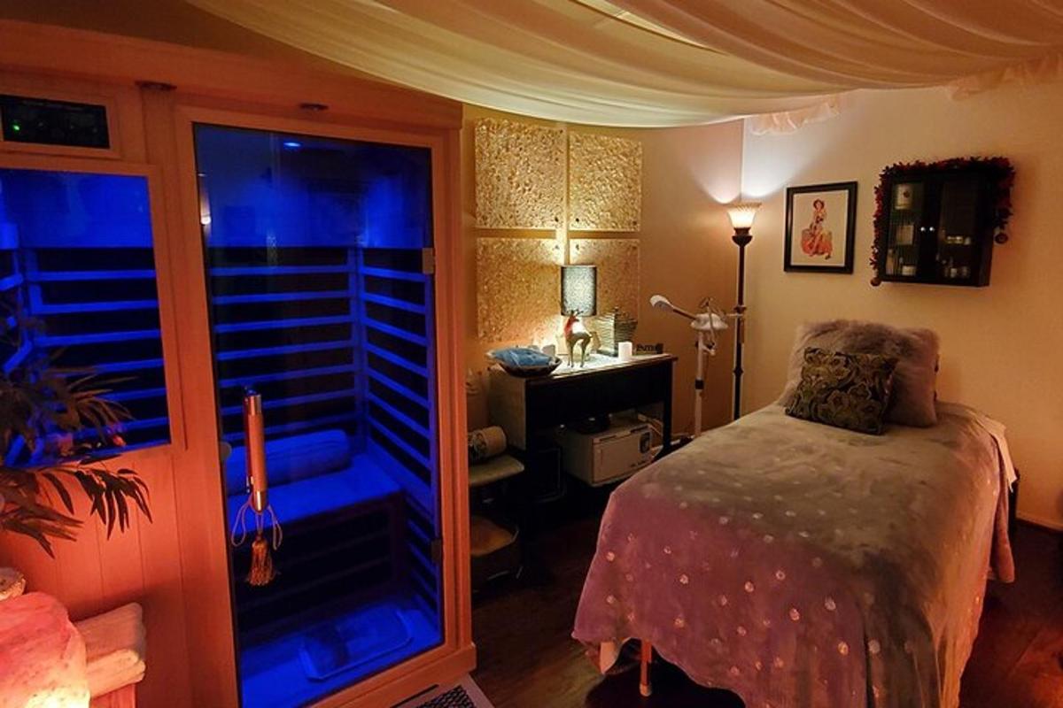 a bedroom with a bed and a desk and a window