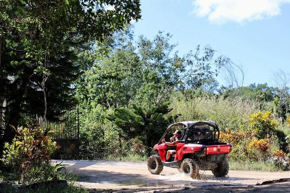 a red atv parked in a parking lot