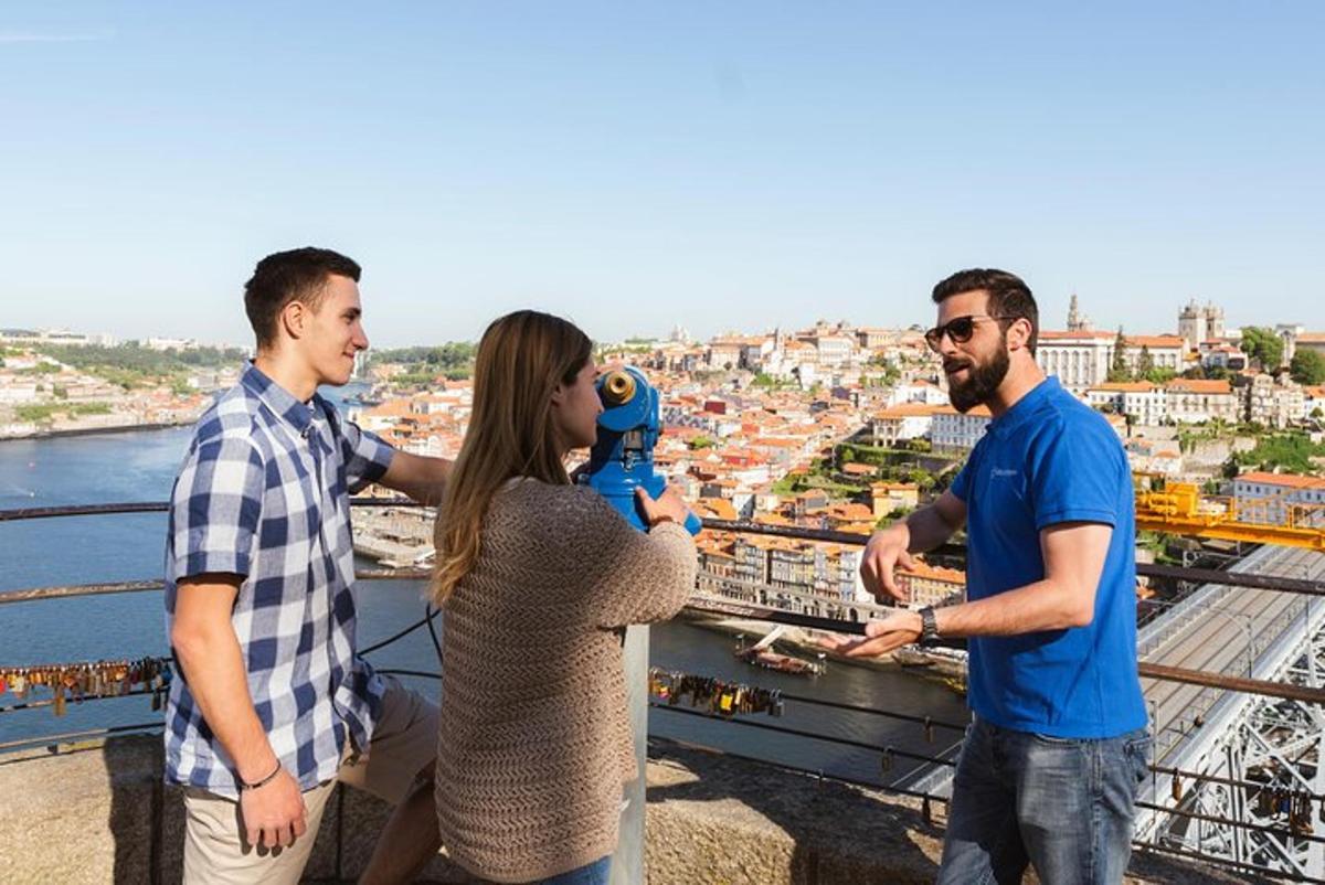 a group of people standing on top of a tower taking a picture