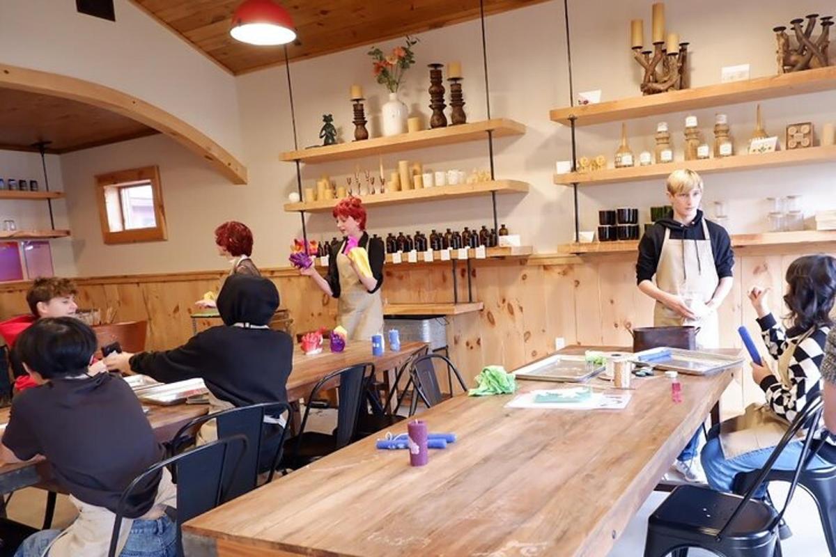 a group of people sitting around a table in a room