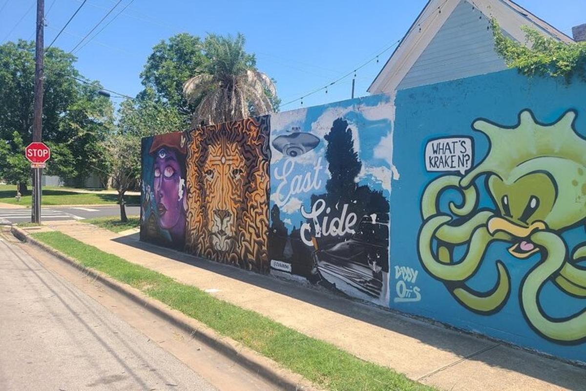 Una pared con un grafiti con una señal de stop