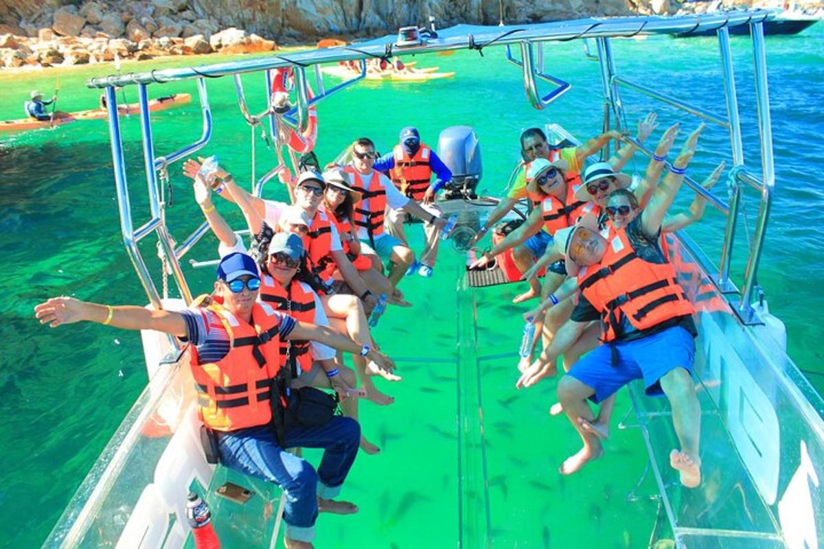 a group of people on a boat in the water