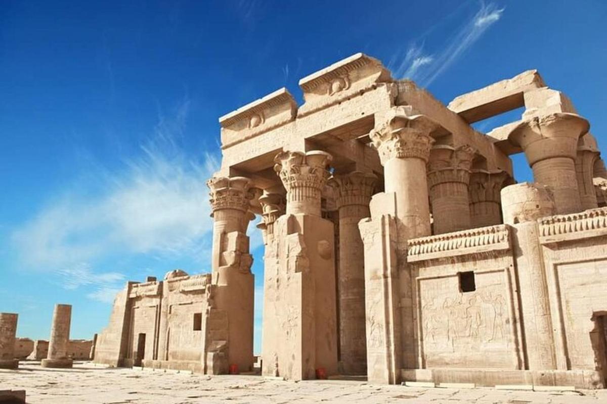 an ancient building with columns in the desert