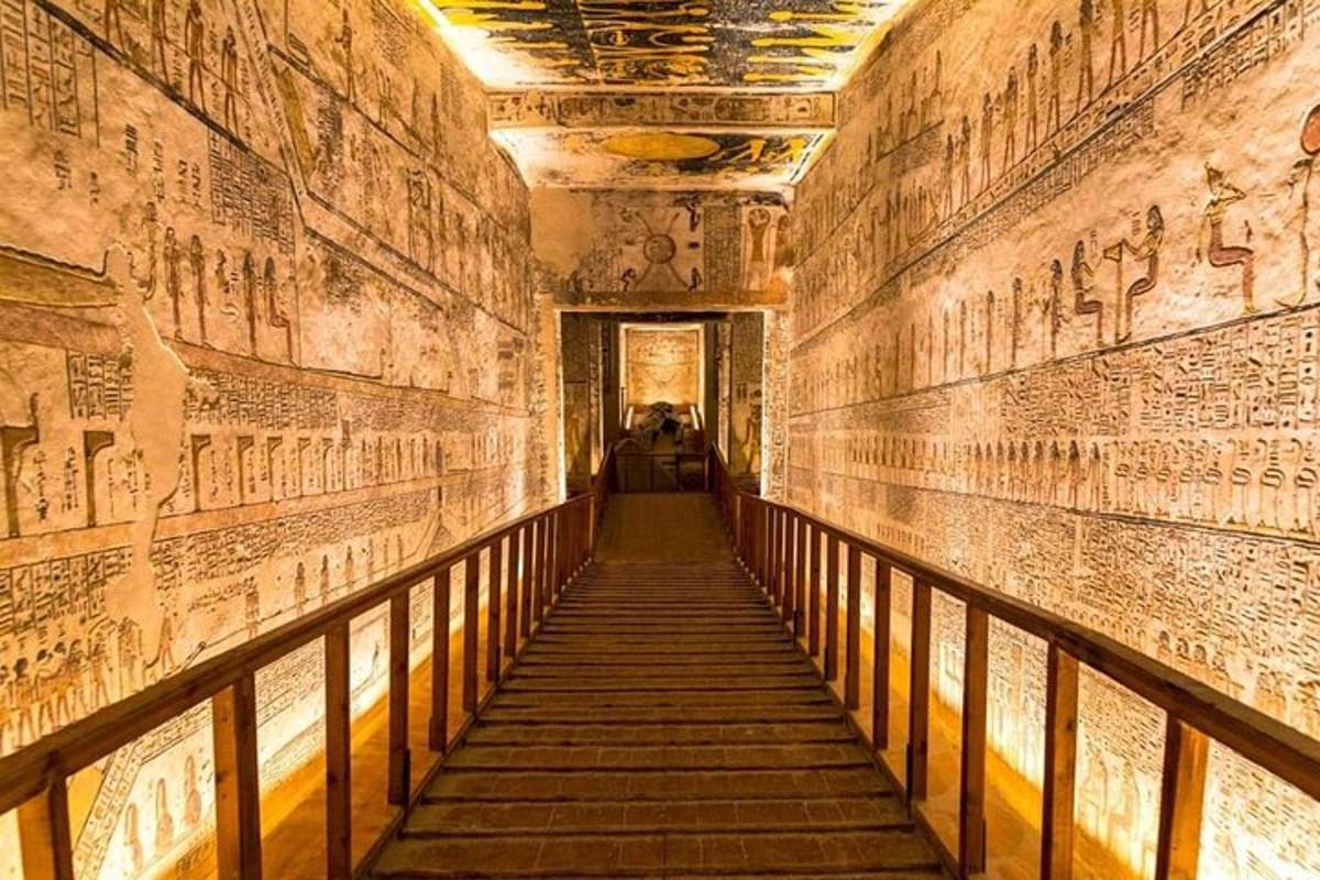 a hallway in an ancient building with reliefs on the walls